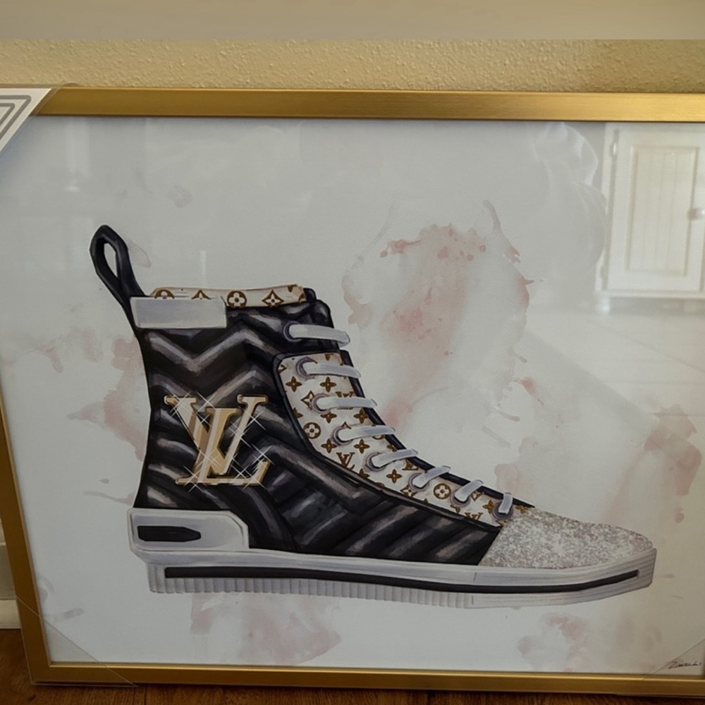 Brand new. Louis Vuitton Sneaker wall art. Size is 20" L x 16" H. Gold frame